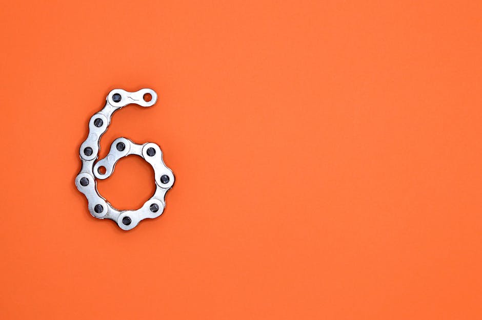 Mechanical chain forming the number six representing core software connectivity